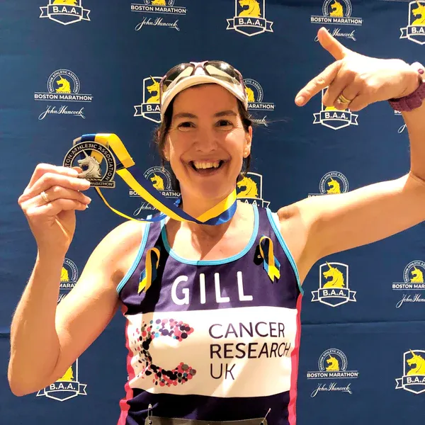 Gill Punt,of the Pride of Essex Ultimate Award 2022, pictured here celebrating her completion of a marathon for Cancer Research UK.