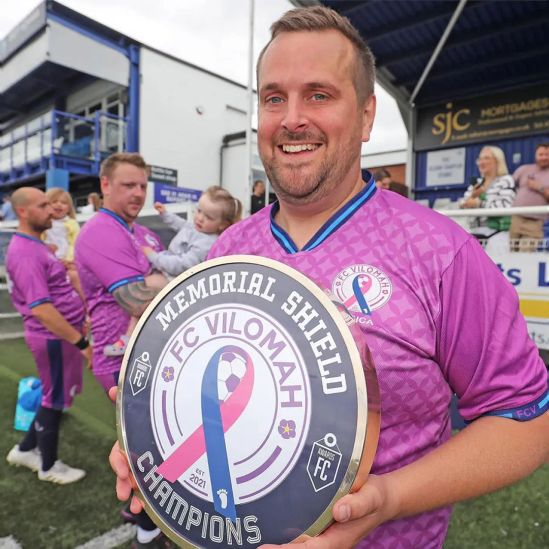 Simon Johns,of the Pride of Essex Ultimate Award 2023, pictured at New Lodge stadium in Billericay with FC Vilomah.